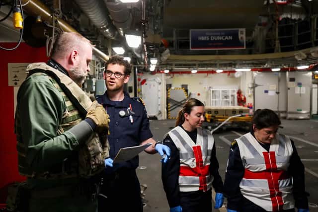 Medical personnel working during the training drill.