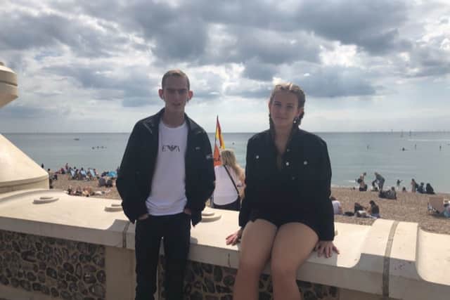 Jayden Brookes, right, with his younger sister Tia.