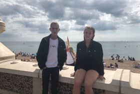 Jayden Brookes, right, with his younger sister Tia.