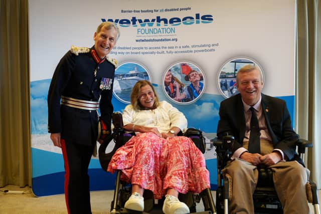 Lord-Lieutenant of Hampshire, Nigel Atkinson with Wetwheels Hamble volunteer Kim and Geoff Holt