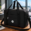 Foldable underseat travel bag designed to fit TUI cabin luggage size guidelines for short breaks and holidays.