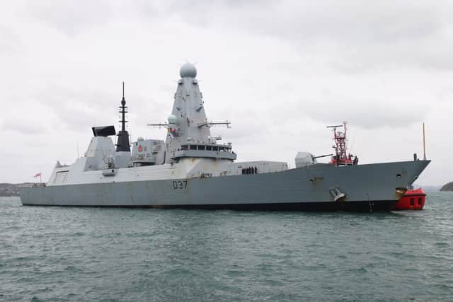 HMS Duncan arrives in Bergen, Norway, during Operation Firecrest.