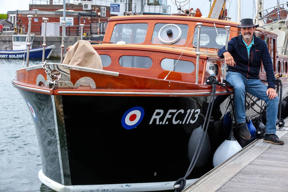 RFC113, a powerboat that played an important role in evacuations throughout the Second World War, has been fully restored after being sold on eBay and found in a field. Pictured: Skipper Guy Riviere, of Michael Dennett's Boatbuilders.