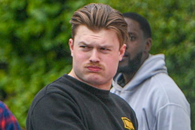 Marine Lucas Johnson outside Bulford Military Court. Four Royal Marines have been locked up after they pummelled a recruit when they saw him 'annoying' a woman at a bar.