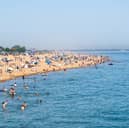 People enjoying the bank holiday sun at Southsea Beach. Pictured by Alec Chapman