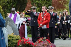 Commander of the UK Carrier Strike Group Commodore Richard Hewitt, and HMS Prince of Wales Commanding Officer Captain Ben Power, salute the fallen trooped killed after trying to stop Nazi Germany building an Atomic Bomb.