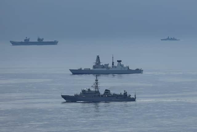 Russian spy ship Yuri Ivanov spotted near HMS Duncan and HMS Prince of Wales during Nato Exercise Dynamic Mongoose in the High North near Norway.