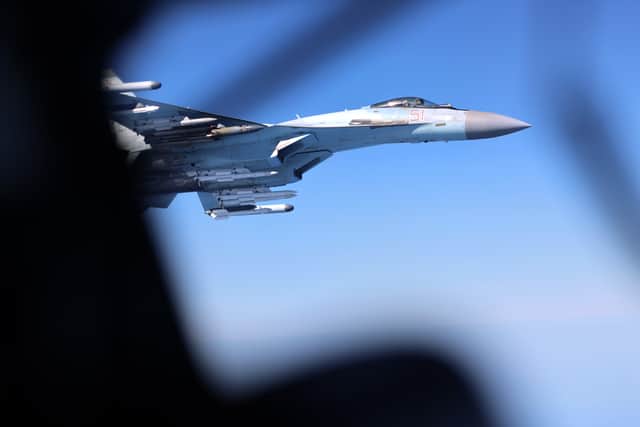 An RAF jet carrying defence secretary John Healey has its GPS jammed near the Russian border. Pictured: Image of a Russian Su-35, seen here alongside an RAF Rivet Joint aircraft over the Black Sea in April 2026, a previously incident.