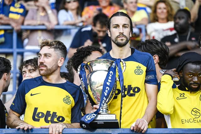 Christian Burgess and his Union Saint-Gilloise team-mates lifted the Belgian Cup with victory over RSC Anderlecht last month.