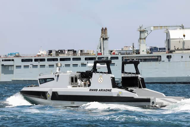 RNMB Ariadne about to embark on RFA Lyme Bay.