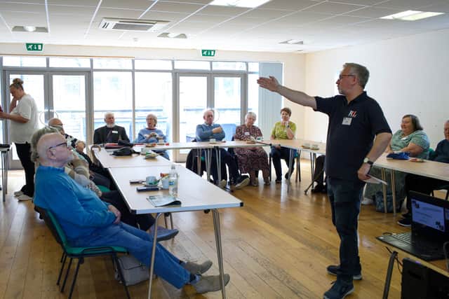 The Royal British Legion runs a support group in Gosport which supports veterans with dementia. Pictured is organiser Cliff Cropley, Royal Navy veteran, speaking to the attendees.