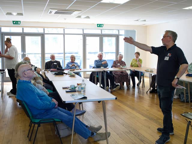 The Royal British Legion runs a support group in Gosport which supports veterans with dementia. Pictured is organiser Cliff Cropley, Royal Navy veteran, speaking to the attendees.