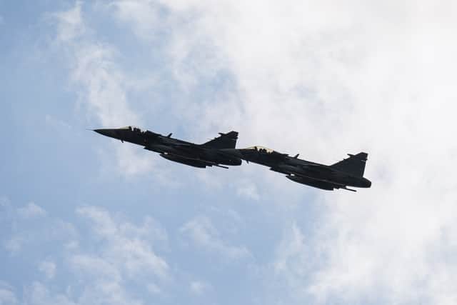A deal has been struck between the UK and Sweden to build components for Gripen fighter jets, with the aircraft being donated to Ukraine to bolster its war effort against Russia. Pictured: Swedish Air Force Saab Gripen fighter jets fly over Helsingborg, Sweden, on May 21, 2026.