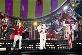 (L-R) Gary Barlow, Mark Owen and Howard Donald of Take That perform live on stage during the "The Circus Live" stadium tour at St Mary's Stadium on May 29, 2026 in Southampton, England. (Photo by Gareth Cattermole/Getty Images for Take That)