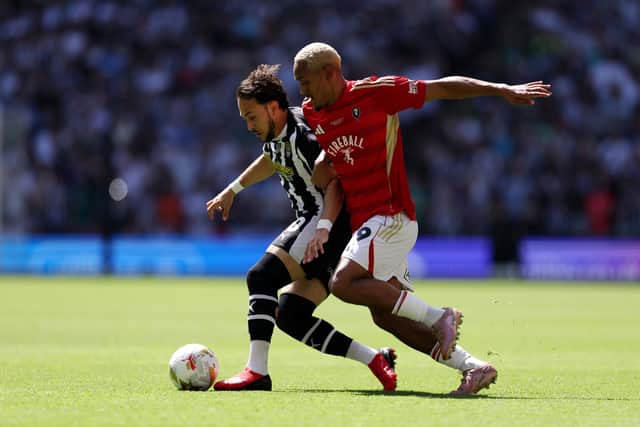 Haji Mnoga, right, has left Salford following their defeat in the League Two play-off final against Salford. Picture: Justin Setterfield/Getty Images)