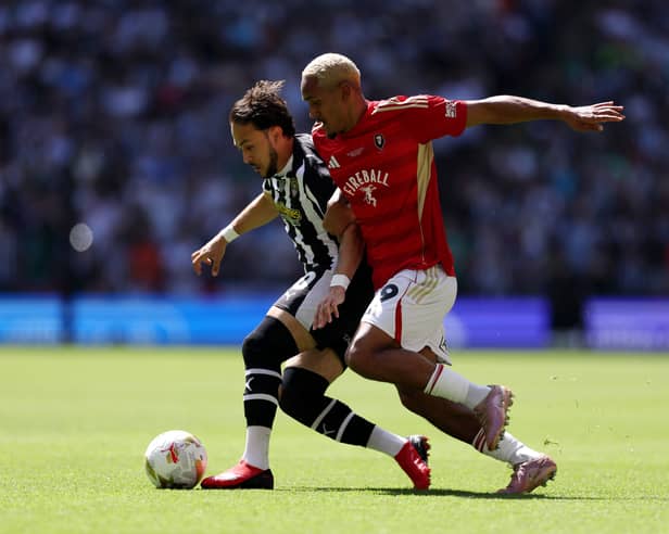 Haji Mnoga, right, has left Salford following their defeat in the League Two play-off final against Salford. Picture: Justin Setterfield/Getty Images)