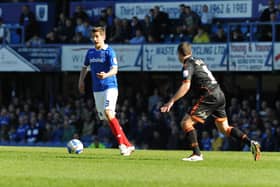 Shaun Cooper playing for Pompey, as the club moved into community ownership against Sheffield United in 2013.