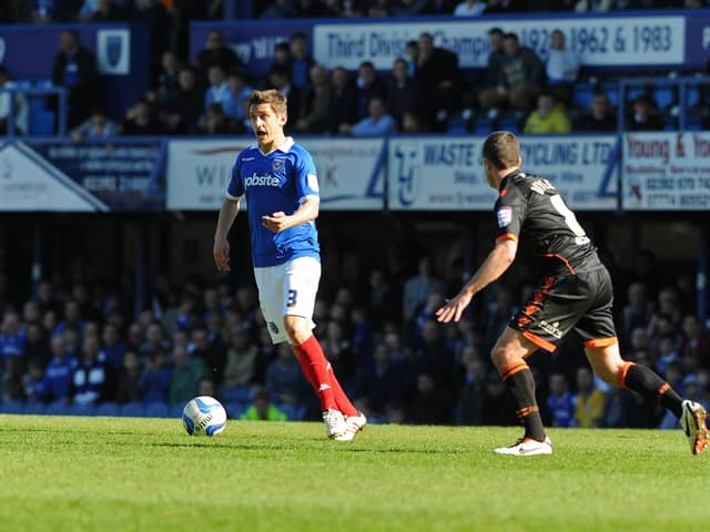 Shaun Cooper playing for Pompey, as the club moved into community ownership against Sheffield United in 2013.