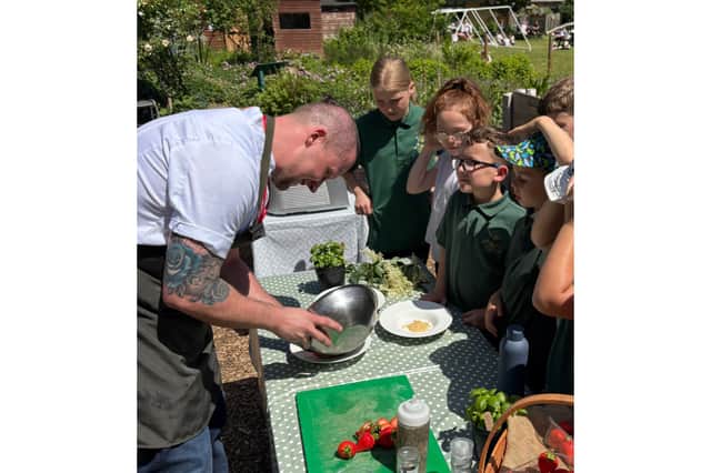 Masterchef: The Professionals finalist Luke Emmess cooking at Wicor Primary School in Portchester