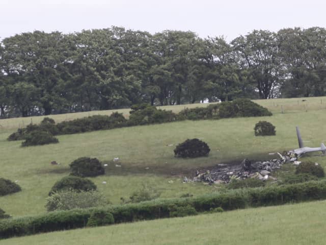 The scene in Sourton Down, near Okehampton in Devon, where a Royal Navy helicopter crashed in a field just before 4am today. Picture date: Wednesday June 3, 2026.