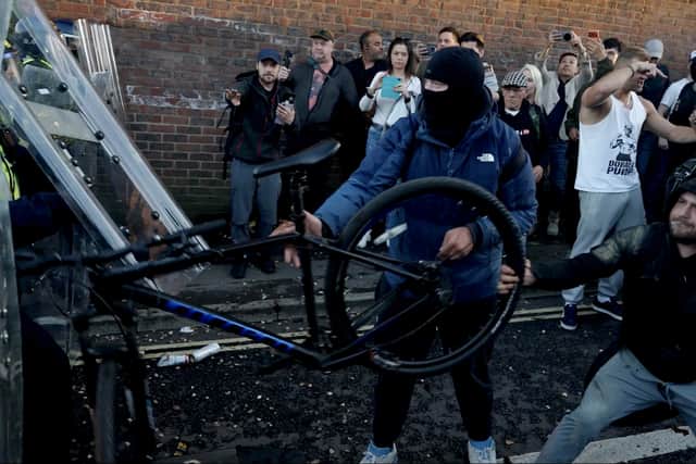 Police and protestors clashing in Southampton during a protest after the death of Henry Nowak (Jamie Lashmar/PA)