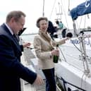 Princess Anne, Princess Royal prepares to pour Champagne on the Challenger 5 yacht with CEO Alastair Floyd during a visit to Tall Ships Youth Trust at Gunwharf Quays Marina on June 04, 2026 in Portsmouth, England. The Princess is a supporter of The Tall Ships Youth Trust the UK's oldest and largest youth development sail-training charity (Photo by Chris Jackson/Getty Images for Tall Ships Youth Trust)