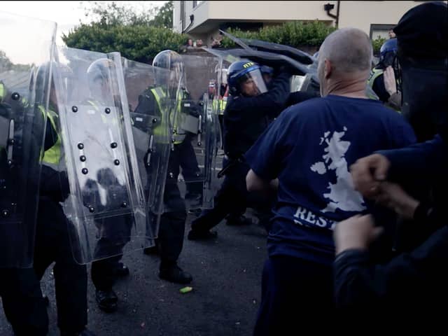 Police and protesters clashing in Southampton during a protest following the death of Henry Nowak