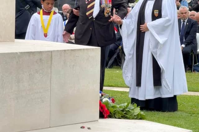 Portsmouth chorister Micah (aged 11) helped lay a wreath in Normandy with veteran Richard Brock, 102.