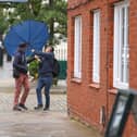Brolly trouble in the High Street. Wild weather on Saturday morning in Old Portsmouth
Picture: Chris Moorhouse (060626-16)