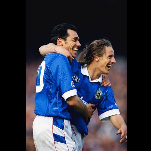 PORTSMOUTH, UNITED KINGDOM - MARCH 27:  Portsmouth striker Guy Whittingham celebrates a goal with strike partner Paul Walsh during a League Division One match between Portsmouth and Oxford United at Fratton Park on March 27, 1993 in Portsmouth, England, Whittingham scored a record 42 league goals during that 1992/93 season.  (Photo by Anton Want/Allsport/Getty Images)