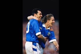 PORTSMOUTH, UNITED KINGDOM - MARCH 27:  Portsmouth striker Guy Whittingham celebrates a goal with strike partner Paul Walsh during a League Division One match between Portsmouth and Oxford United at Fratton Park on March 27, 1993 in Portsmouth, England, Whittingham scored a record 42 league goals during that 1992/93 season.  (Photo by Anton Want/Allsport/Getty Images)