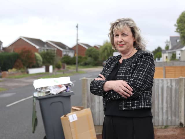 Deborah Cooper outside her home with her recycle bin in Hayling Island on 8th June 2026