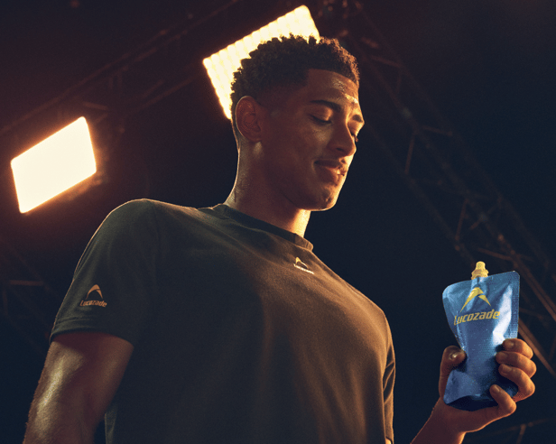 England midfielder Jude Bellingham with Lucozade Elite, a new high-carbohydrate fuelling pouch developed exclusively for England teams