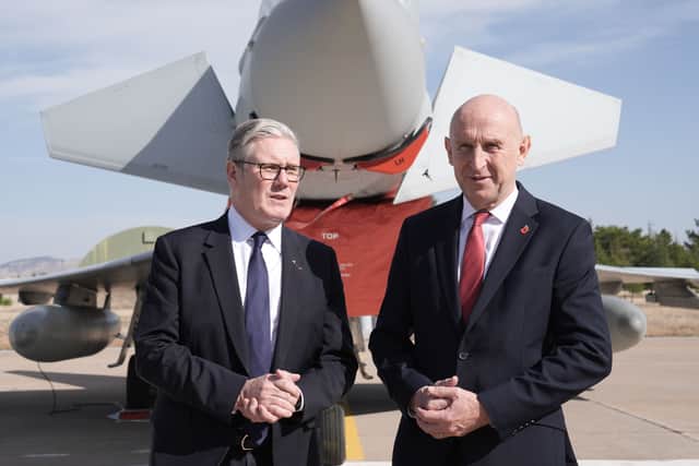 Prime Minister Sir Keir Starmer and then-defence secretary John Healey in front of a UK Typhoon fighter jet at Tusas airbase in Ankara during a visit to Turkey in October 2025