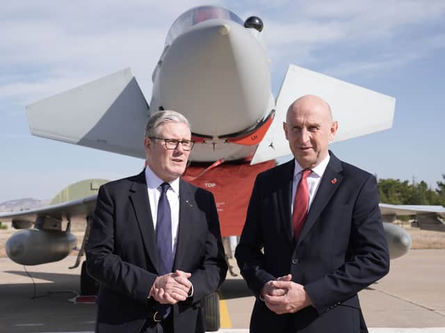 Prime Minister Sir Keir Starmer and then-defence secretary John Healey in front of a UK Typhoon fighter jet at Tusas airbase in Ankara during a visit to Turkey in October 2025