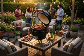 The compact ceramic kamado grill is designed to offer efficient heat retention for grilling, smoking and outdoor baking