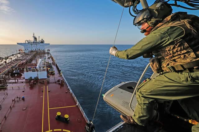 Royal marines boarding the sanctioned ship.