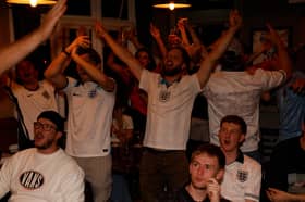 Fans celebrate at the Red Lion pub in Cosham
