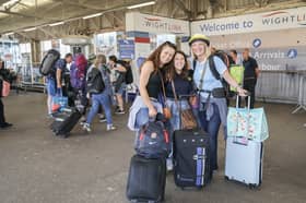 Isle of Wight Festival goers on route to the Isle of Wight via hovertravel and Wightlink ferries on Thursday 18th June 2026

Pictured: Jen Gostling, Lyndy Lay and Phil Newbery on route to the Isle of Wight from Portsmouth Harbour

Picture: Habibur Rahman