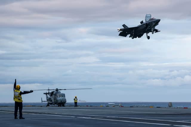 Pictured: F-35B Lightning Jets landing on the flight deck on Fleet Flagship, HMS Prince of Wales.