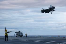 Pictured: F-35B Lightning Jets landing on the flight deck on Fleet Flagship, HMS Prince of Wales.
