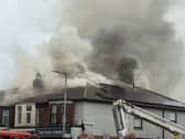 Smoke can be seen pouring from a flat in Cosham as the public are warned to avoid the area.