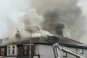 Smoke can be seen pouring from a flat in Cosham as the public are warned to avoid the area.