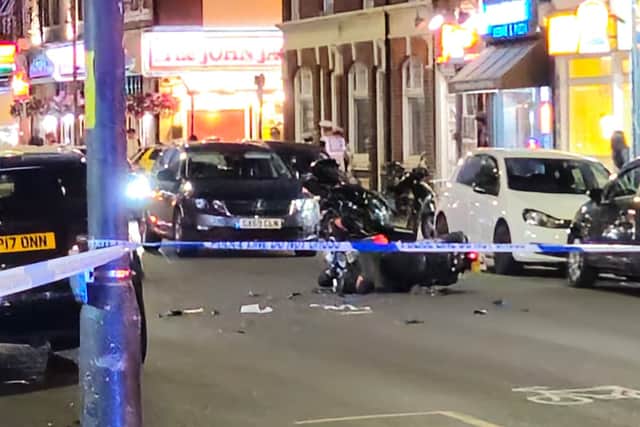 A moped rider is fighting for his life following a crash with a parked car in Fratton Road on June 20.