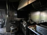 Smoke poured out of a takeaway in Cosham and spread to a nearby flat and over the railway line. Pictured is the inside of Royal Kebab House.