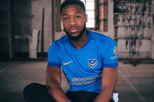 Ebou Adams models the new home kit for the 2026-27 season.