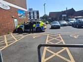 Armed police and fire crews have been deployed to Portchester Precinct, with part of the area "sealed off" from the public.