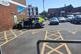 Armed police and fire crews have been deployed to Portchester Precinct, with part of the area "sealed off" from the public.