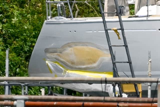 PICTURED:  Lutine, a yacht that is currently being repaired at Hamble Point Marina after being involved in a crash with a Royal Navy Rattler-class boat. Lutine is pictured here with repairs visible on the stern end of her starboard side, this is the yellow patch visible here.
