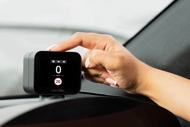 Just one press of a button will help other drivers avoid potential pitfalls